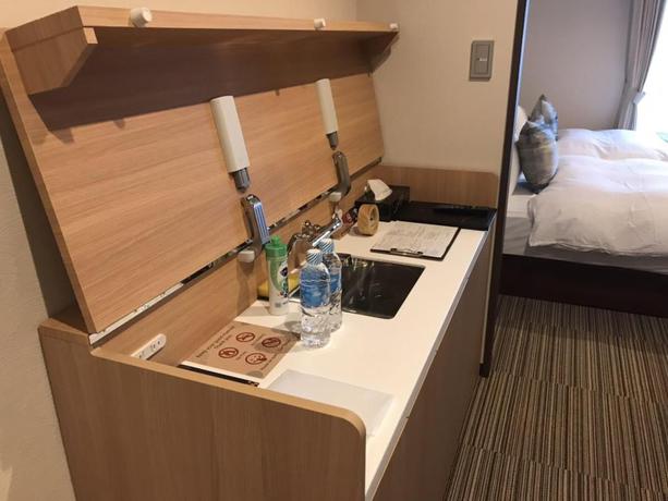 Imagen de la habitación del Hotel Stay SAKURA Kyoto TSUBAKI. Foto 11