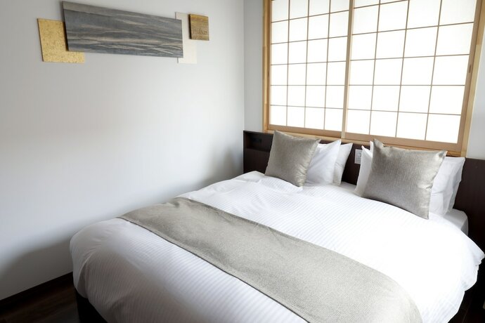 Imagen de la habitación del Hotel Stay Sakura Kyoto Suzaku Oji. Foto 18