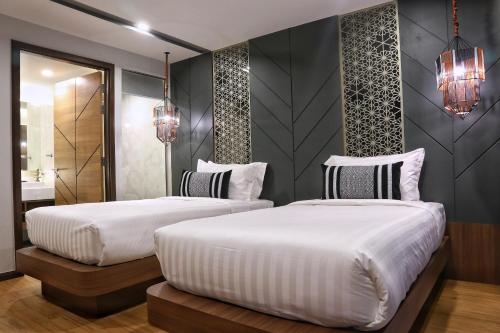 Imagen de la habitación del Hotel Stay With Nimman Chiang Mai. Foto 9