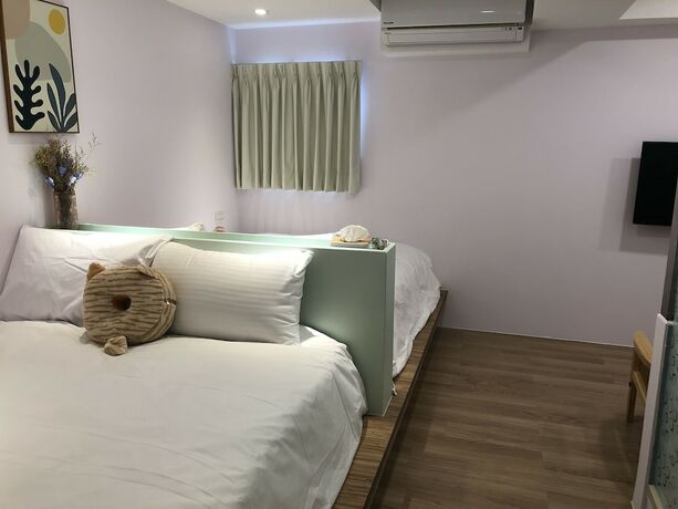 Imagen de la habitación del Hotel Stay a moment inn. Foto 13