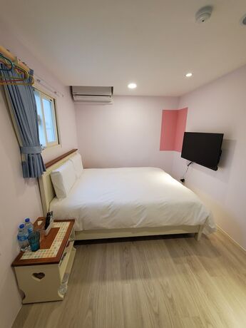 Imagen de la habitación del Hotel Stay a moment inn. Foto 14