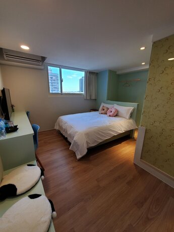 Imagen de la habitación del Hotel Stay a moment inn. Foto 17