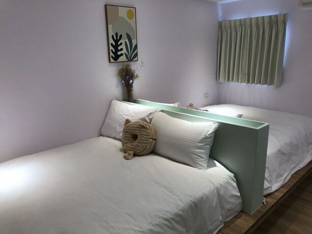 Imagen de la habitación del Hotel Stay a moment inn. Foto 19