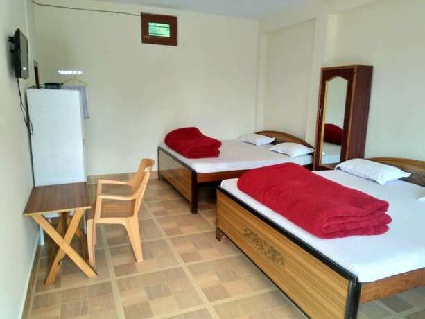 Imagen de la habitación del Hotel StayApart - Maa Anadmayee Guest House. Foto 17