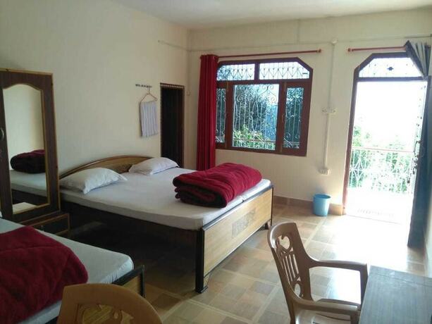 Imagen de la habitación del Hotel StayApart - Maa Anadmayee Guest House. Foto 19