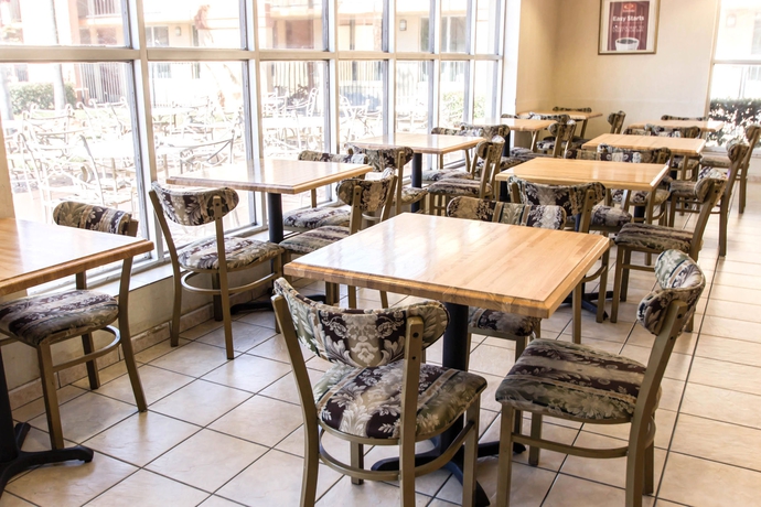 Imagen del bar/restaurante del Hotel Stayable Suites Orlando. Foto 4