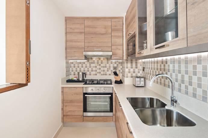 Imagen de la habitación del Hotel Staybridge Suites Dubai Al-Maktoum Airport, an IHG. Foto 2