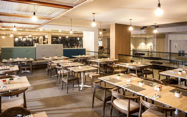 Imagen del bar/restaurante del Hotel Stayeasy Cape Town City Bowl. Foto 16