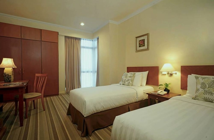 Imagen de la habitación del Hotel Stayinn Gateway Apartment. Foto 11