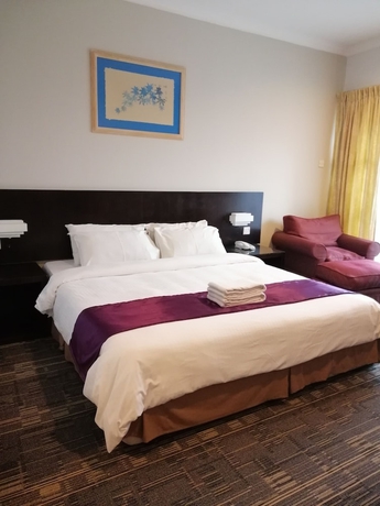 Imagen de la habitación del Hotel Stayinn Gateway Apartment. Foto 19