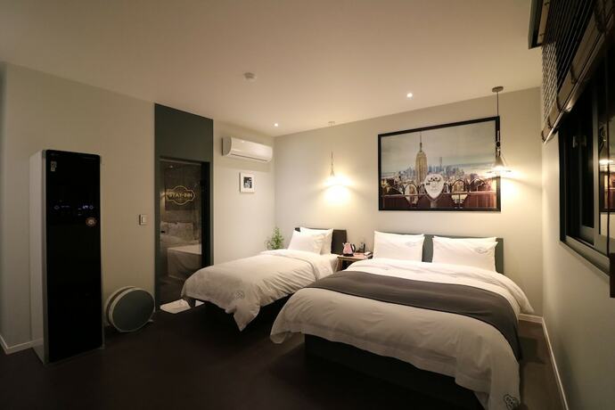 Imagen de la habitación del Hotel Stay-inn Hotel. Foto 18