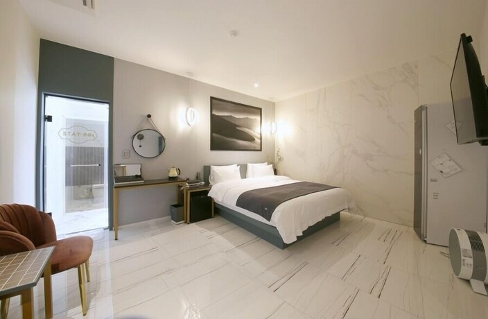 Imagen de la habitación del Hotel Stay-inn Hotel. Foto 19