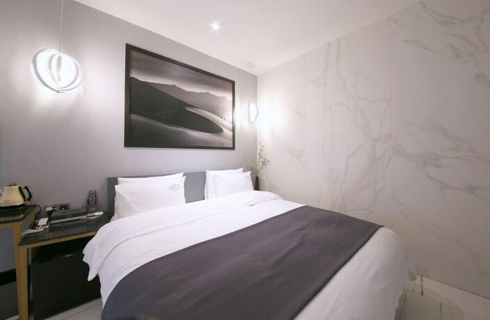 Imagen de la habitación del Hotel Stay-inn Hotel. Foto 26