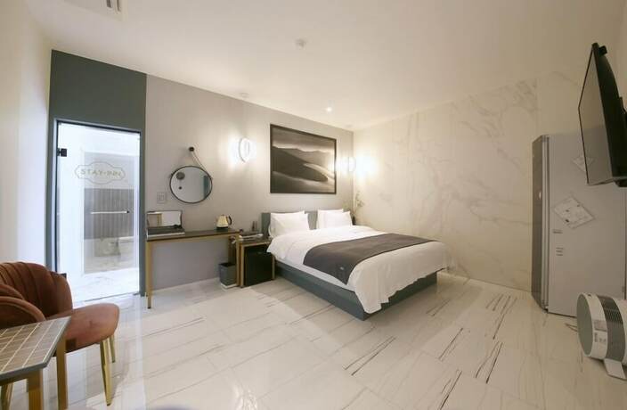 Imagen de la habitación del Hotel Stay-inn Hotel. Foto 27