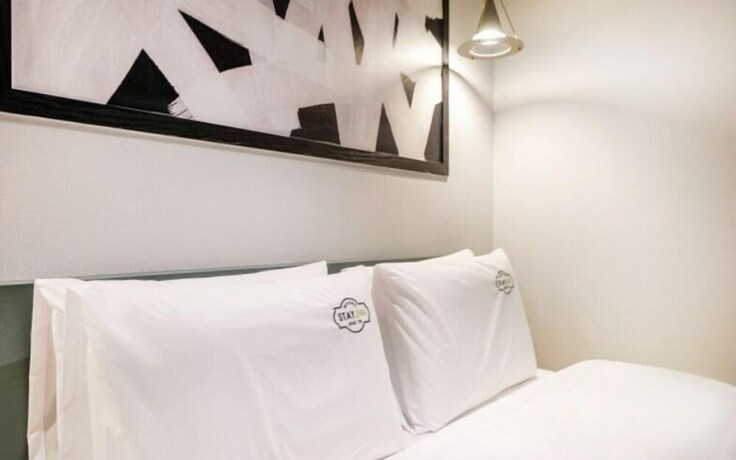 Imagen de la habitación del Hotel Stay-inn Hotel. Foto 29