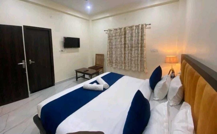 Imagen de la habitación del Hotel Staylo Abhinandan Palace. Foto 9