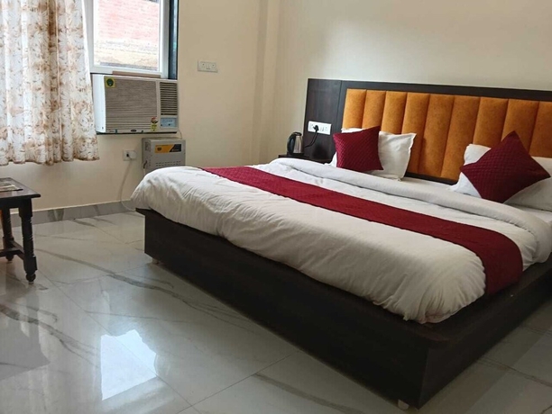 Imagen de la habitación del Hotel Staylo Abhinandan Palace. Foto 10