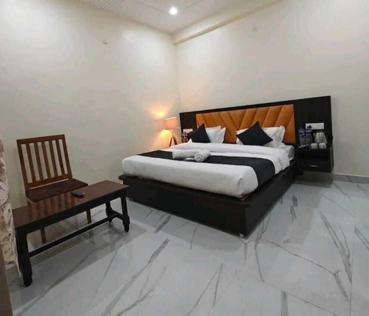 Imagen de la habitación del Hotel Staylo Abhinandan Palace. Foto 13