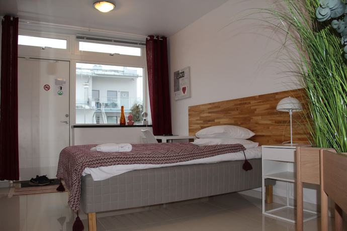 Imagen de la habitación del Hotel Staylong. Foto 11