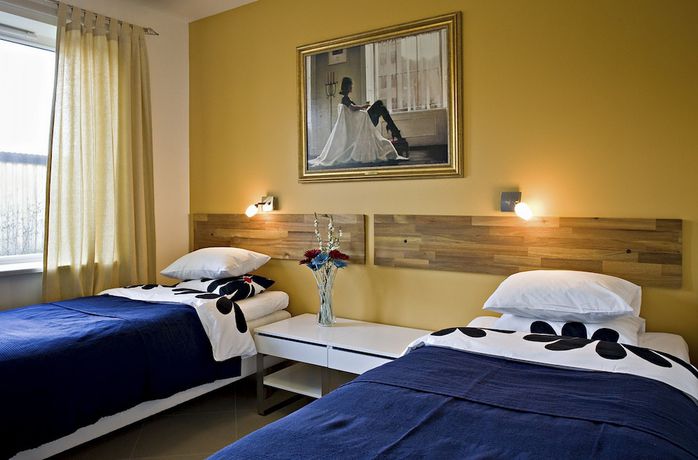 Imagen de la habitación del Hotel Staylong. Foto 16