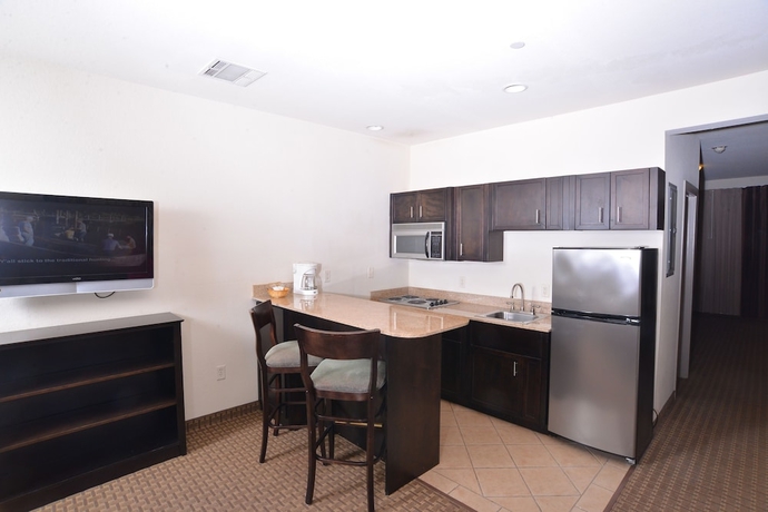 Imagen de la habitación del Hotel Stay-over Suites. Foto 7