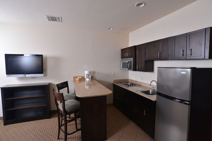 Imagen de la habitación del Hotel Stay-over Suites. Foto 10