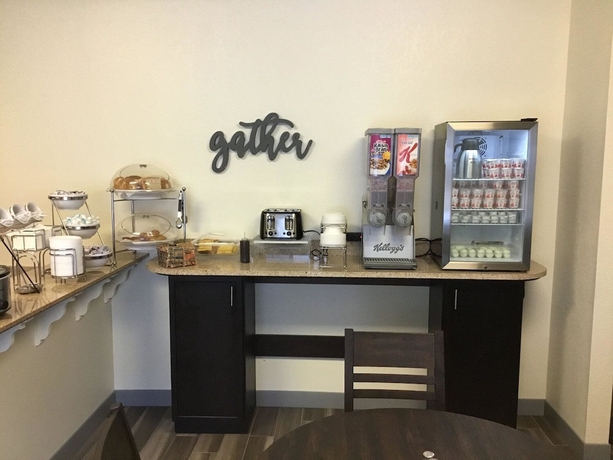 Imagen del bar/restaurante del Hotel Stay-over Suites. Foto 2