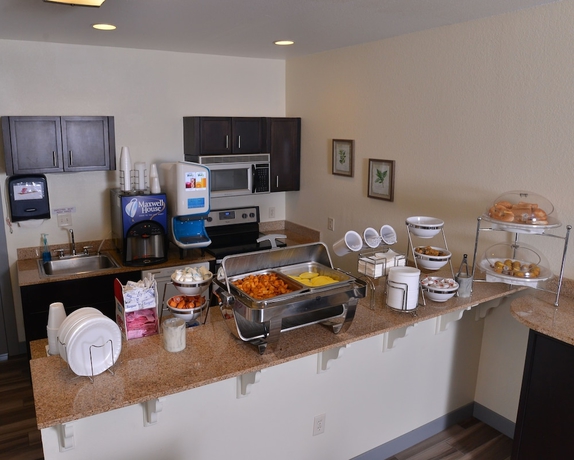 Imagen del bar/restaurante del Hotel Stay-over Suites. Foto 3