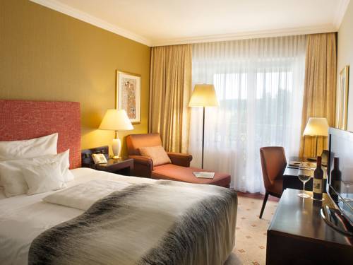 Imagen de la habitación del Hotel Steigenberger Der Sonnenhof. Foto 6