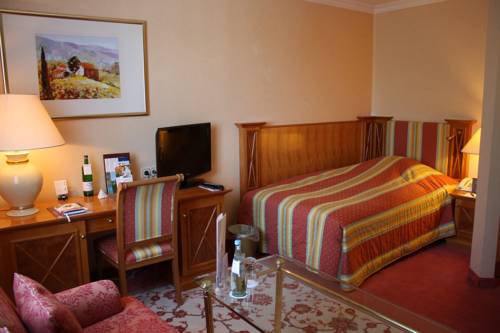 Imagen de la habitación del Hotel Steigenberger Der Sonnenhof. Foto 13