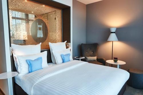 Imagen de la habitación del Hotel Steigenberger München. Foto 9