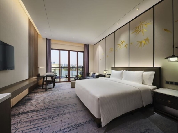 Imagen de la habitación del Hotel Steigenberger Wuxi. Foto 7