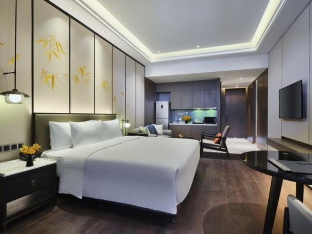 Imagen de la habitación del Hotel Steigenberger Wuxi. Foto 8