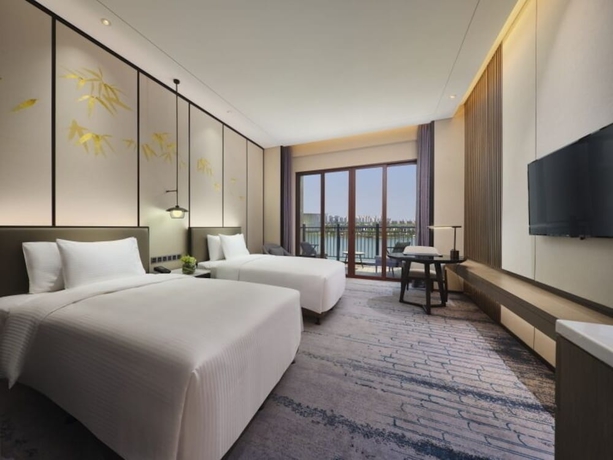 Imagen de la habitación del Hotel Steigenberger Wuxi. Foto 17