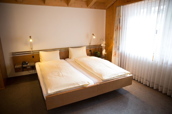 Imagen de la habitación del Hotel Steinbock Grindelwald. Foto 9
