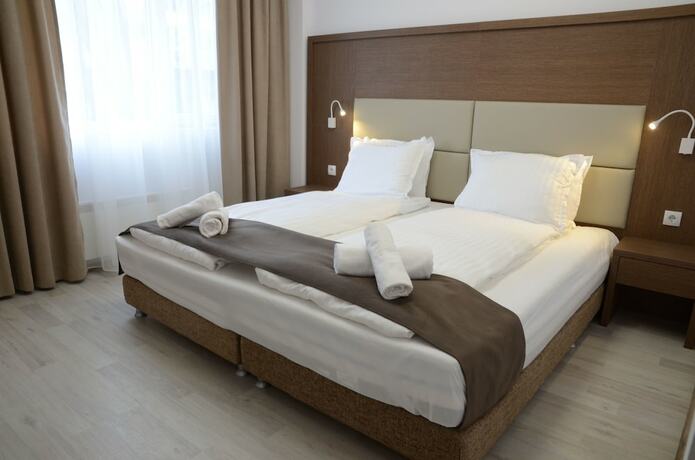 Imagen de la habitación del Hotel Stela Deluxe Apartments. Foto 11