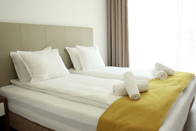 Imagen de la habitación del Hotel Stela Deluxe Apartments. Foto 12