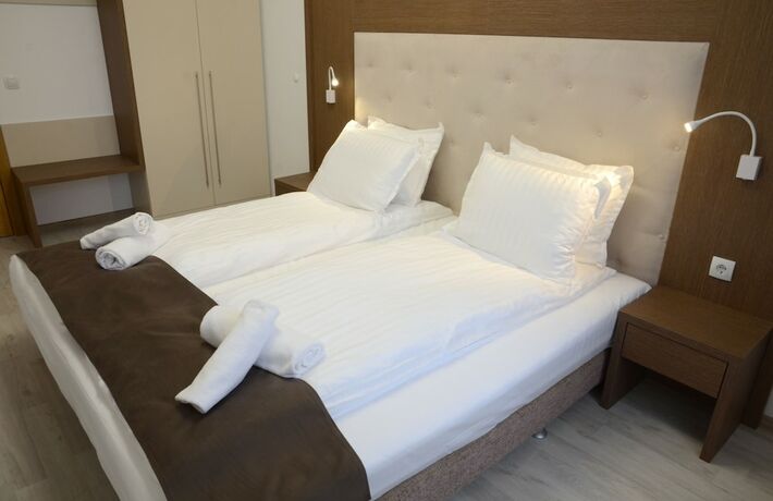 Imagen de la habitación del Hotel Stela Deluxe Apartments. Foto 13