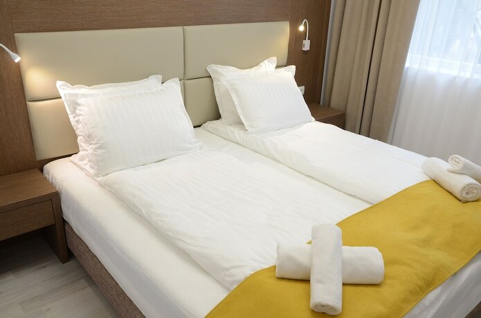 Imagen de la habitación del Hotel Stela Deluxe Apartments. Foto 14