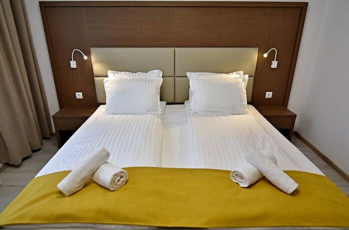 Imagen de la habitación del Hotel Stela Deluxe Apartments. Foto 17