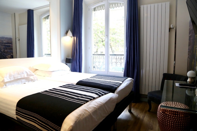 Imagen de la habitación del Hotel Stella Etoile. Foto 2