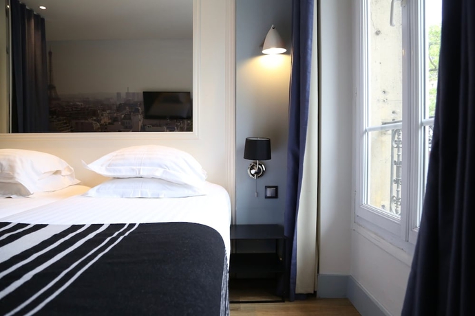 Imagen de la habitación del Hotel Stella Etoile. Foto 5