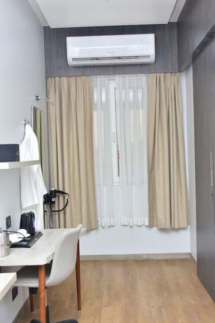 Imagen de la habitación del Hotel Stella, Kinshasa. Foto 11