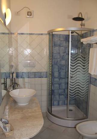 Imagen de la habitación del Hotel Stella Marina, San Teodoro . Foto 6