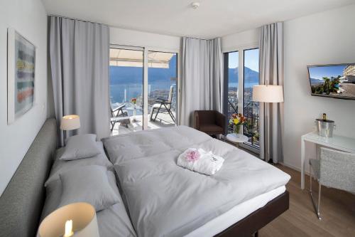 Imagen de la habitación del Hotel Stella, Orselina. Foto 8