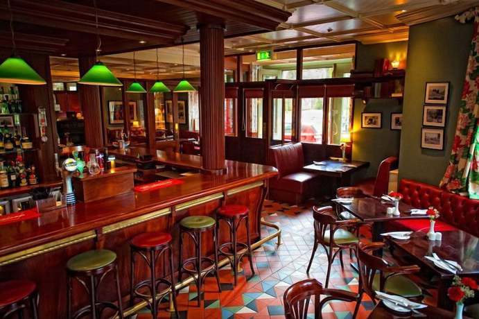 Imagen del bar/restaurante del Hotel Step House. Foto 3