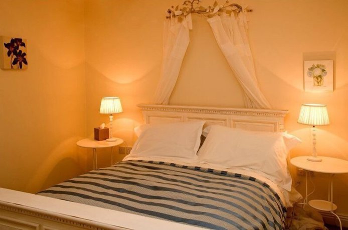 Imagen de la habitación del Hotel Step House. Foto 11