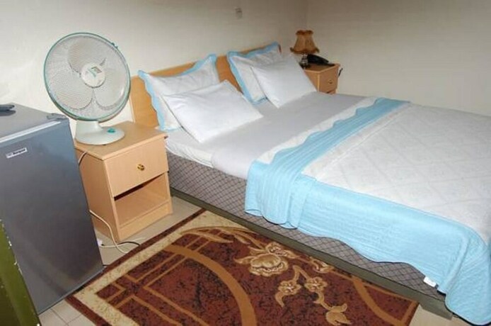 Imagen de la habitación del Hotel Step Town. Foto 20