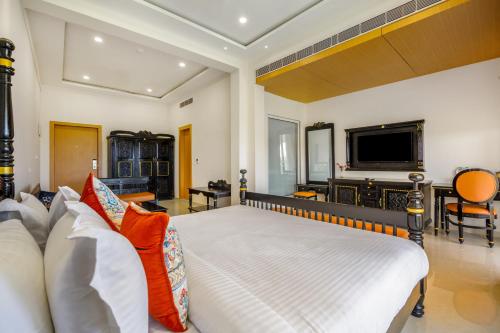 Imagen de la habitación del Hotel Sterling Aravalli Udaipur. Foto 18