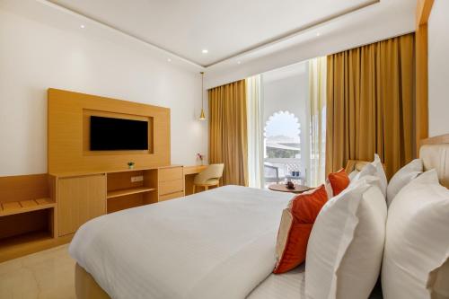 Imagen de la habitación del Hotel Sterling Aravalli Udaipur. Foto 19